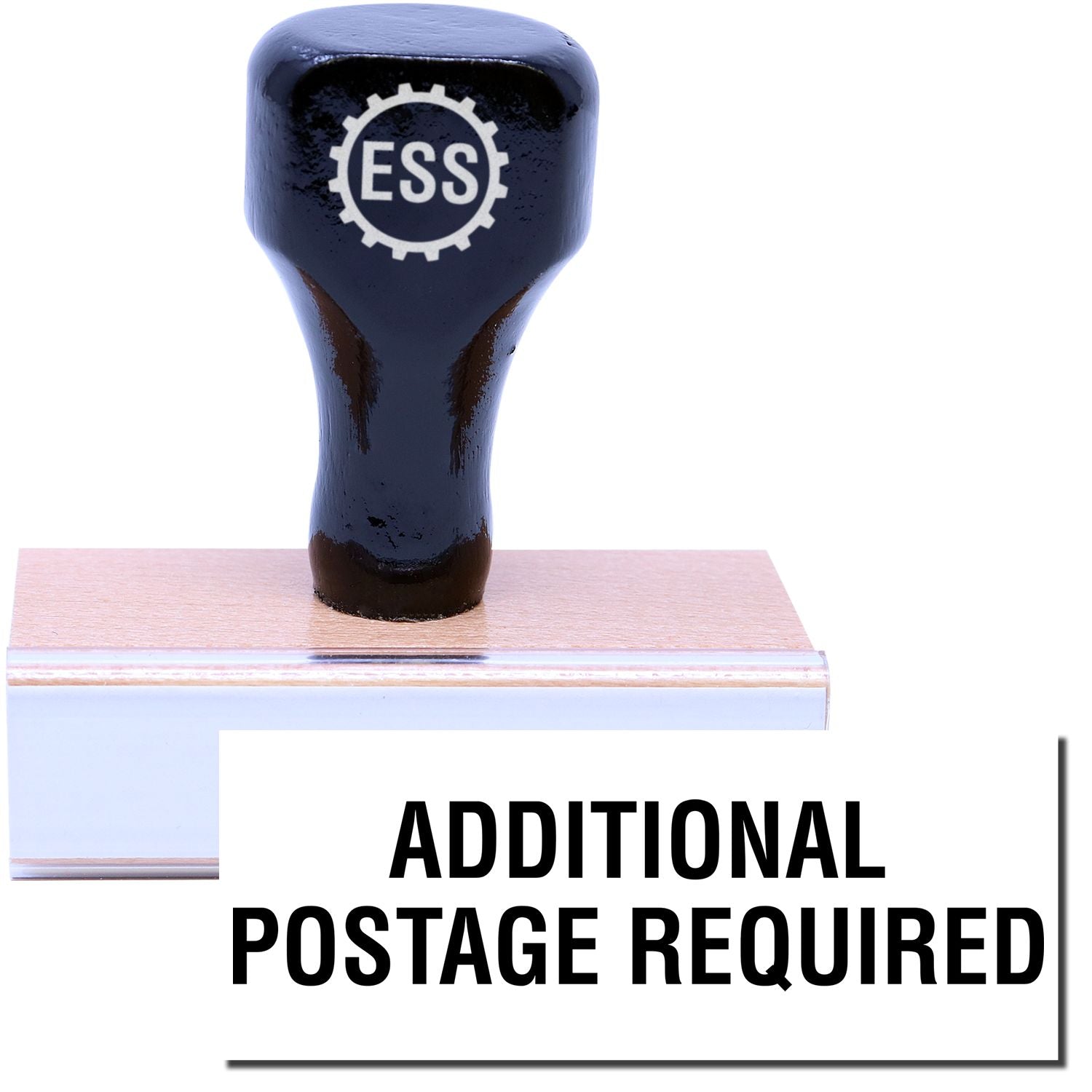 A stock office rubber stamp with a stamped image showing how the text ADDITIONAL POSTAGE REQUIRED is displayed after stamping.