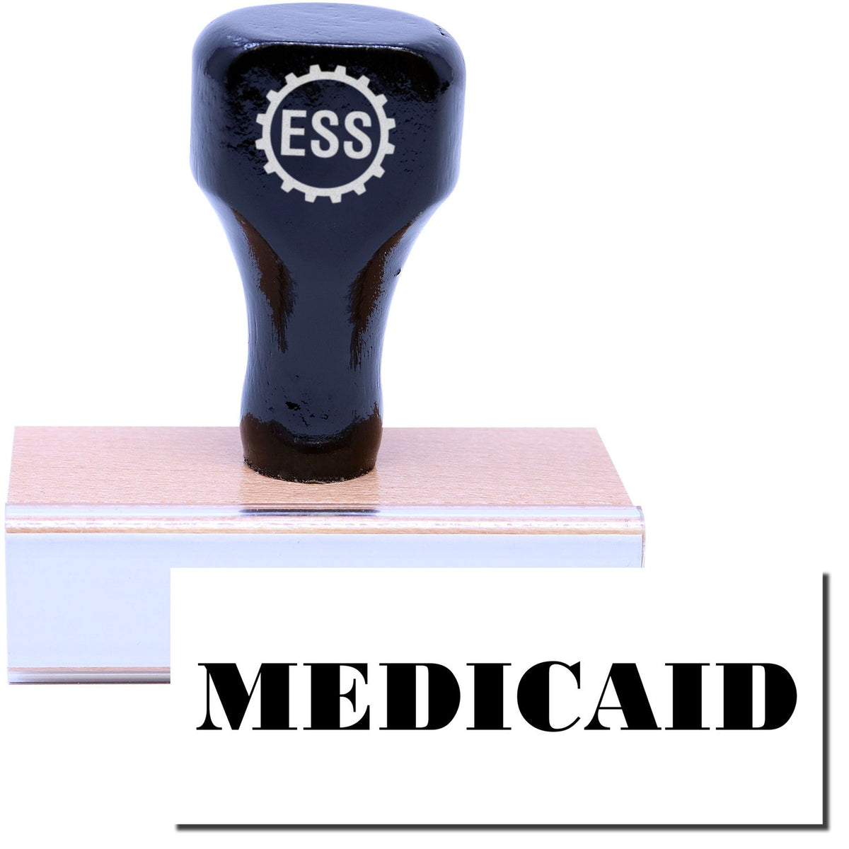 A stock office rubber stamp with a stamped image showing how the text &quot;MEDICAID&quot; is displayed after stamping.