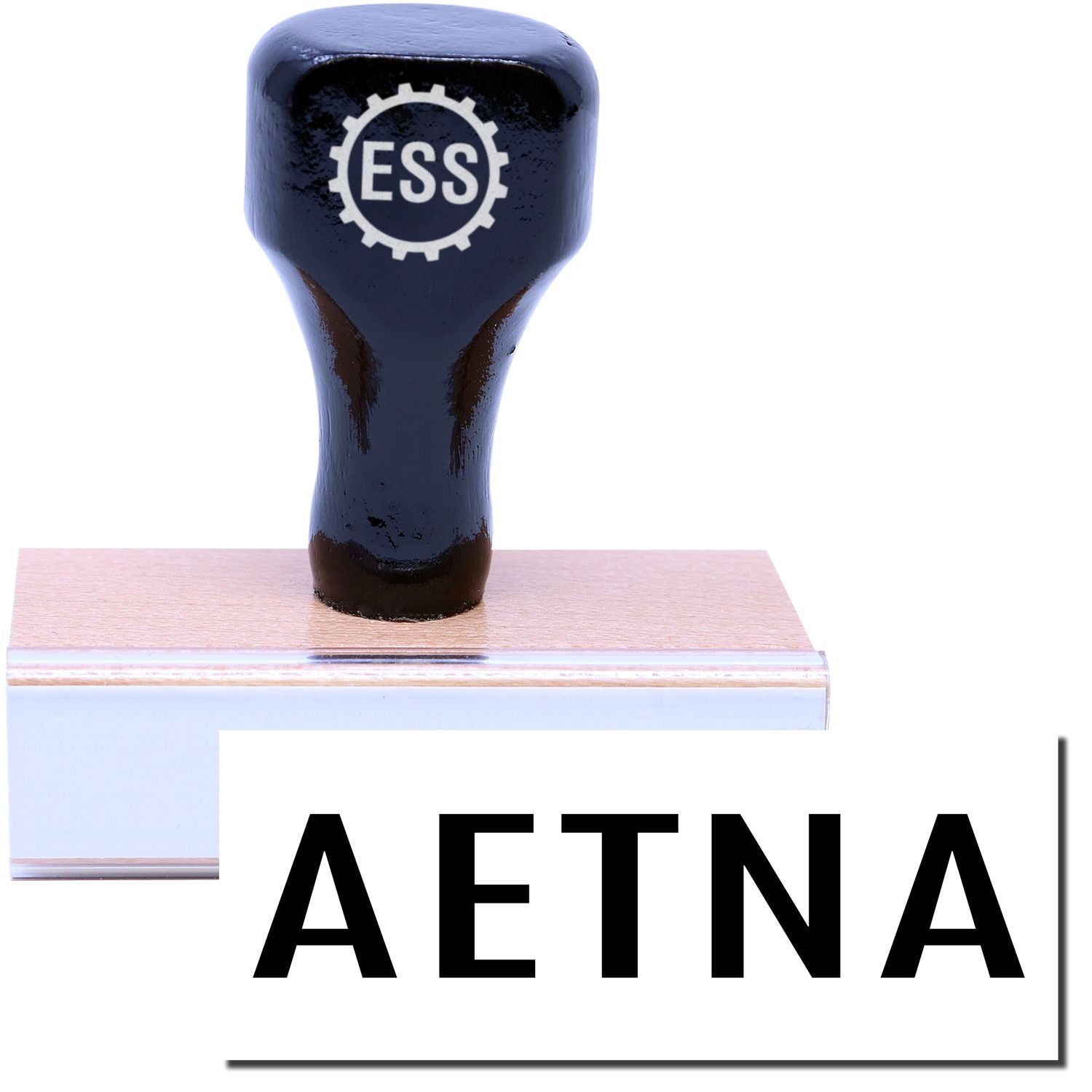 A stock office medical rubber stamp with a stamped image showing how the text "AETNA" is displayed after stamping.
