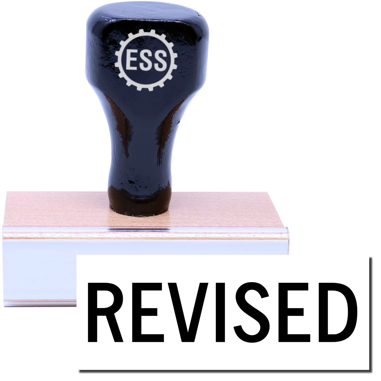 A stock office rubber stamp with a stamped image showing how the text "REVISED" is displayed after stamping.