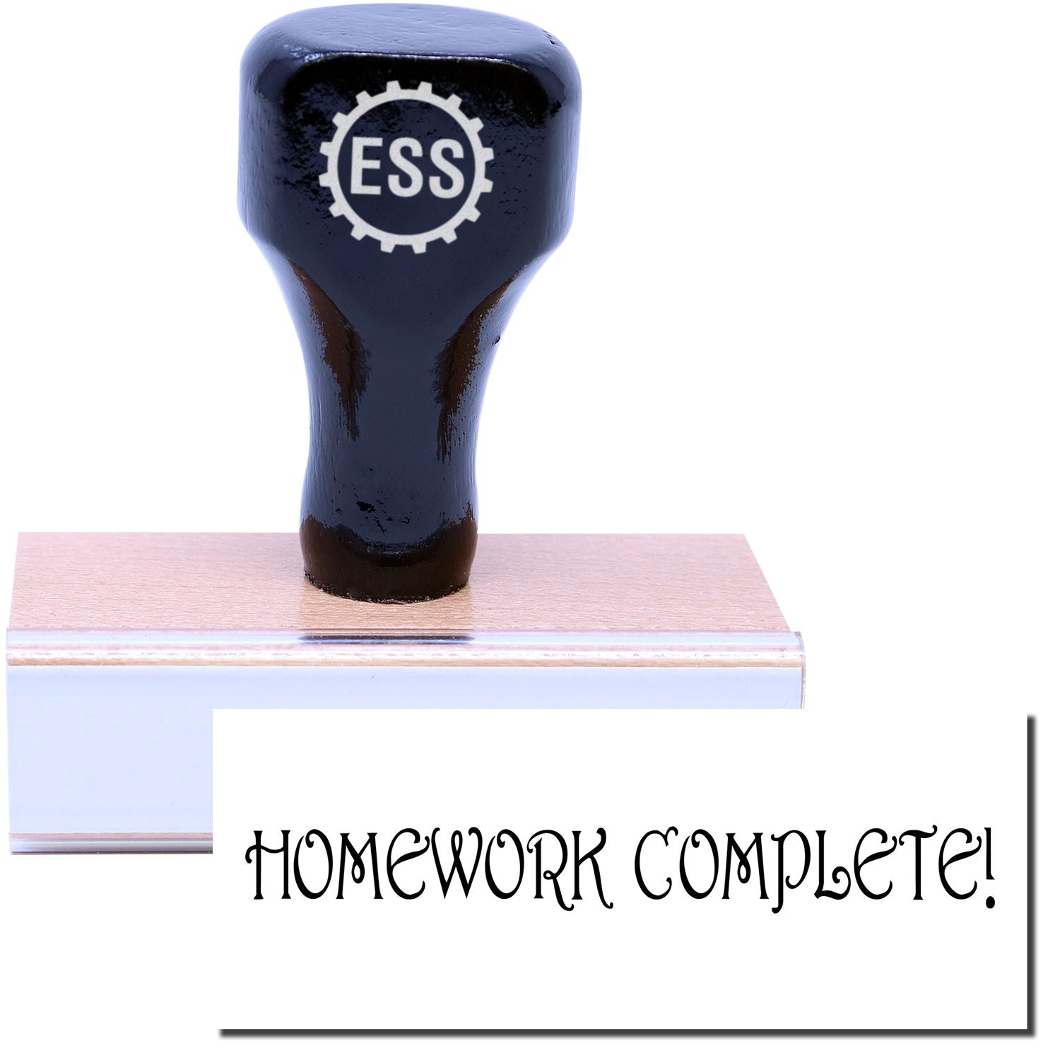 A stock office rubber stamp with a stamped image showing how the text HOMEWORK COMPLETE! is displayed after stamping.