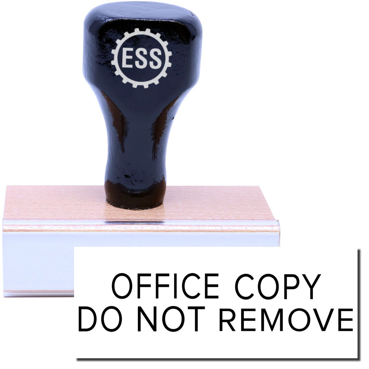 A stock office rubber stamp with a stamped image showing how the text &quot;OFFICE COPY DO NOT REMOVE&quot; in a narrow font is displayed after stamping.