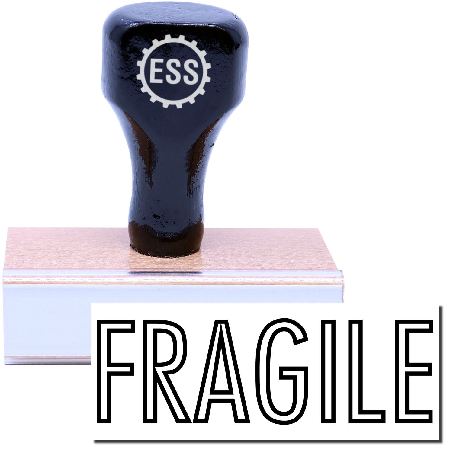 A stock office rubber stamp with a stamped image showing how the text FRAGILE in an outline font is displayed after stamping.