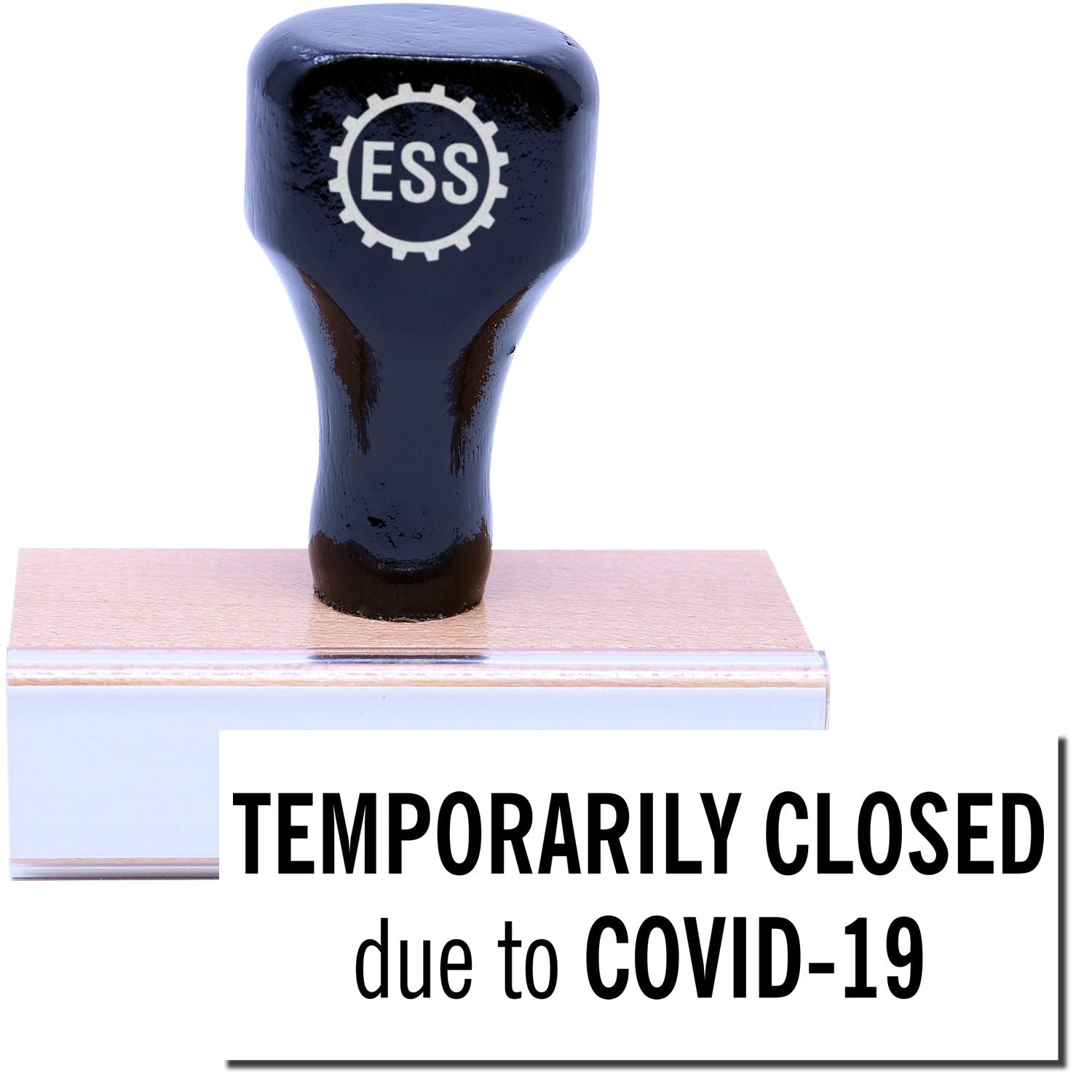 A stock office rubber stamp with a stamped image showing how the text TEMPORARILY CLOSED due to COVID-19 is displayed after stamping.