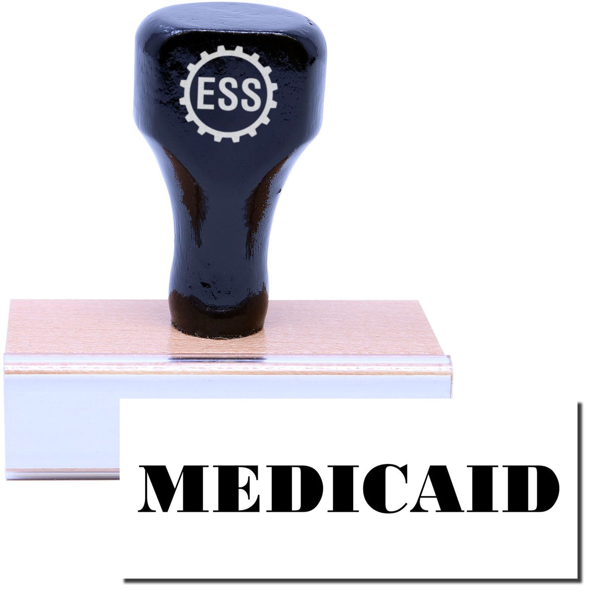 A stock office rubber stamp with a stamped image showing how the text &quot;MEDICAID&quot; in a large font is displayed after stamping.