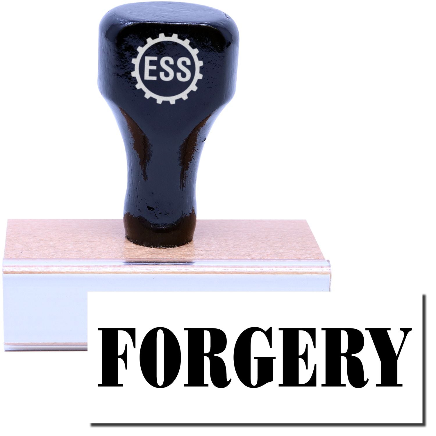 A stock office rubber stamp with a stamped image showing how the text FORGERY in a large font is displayed after stamping.