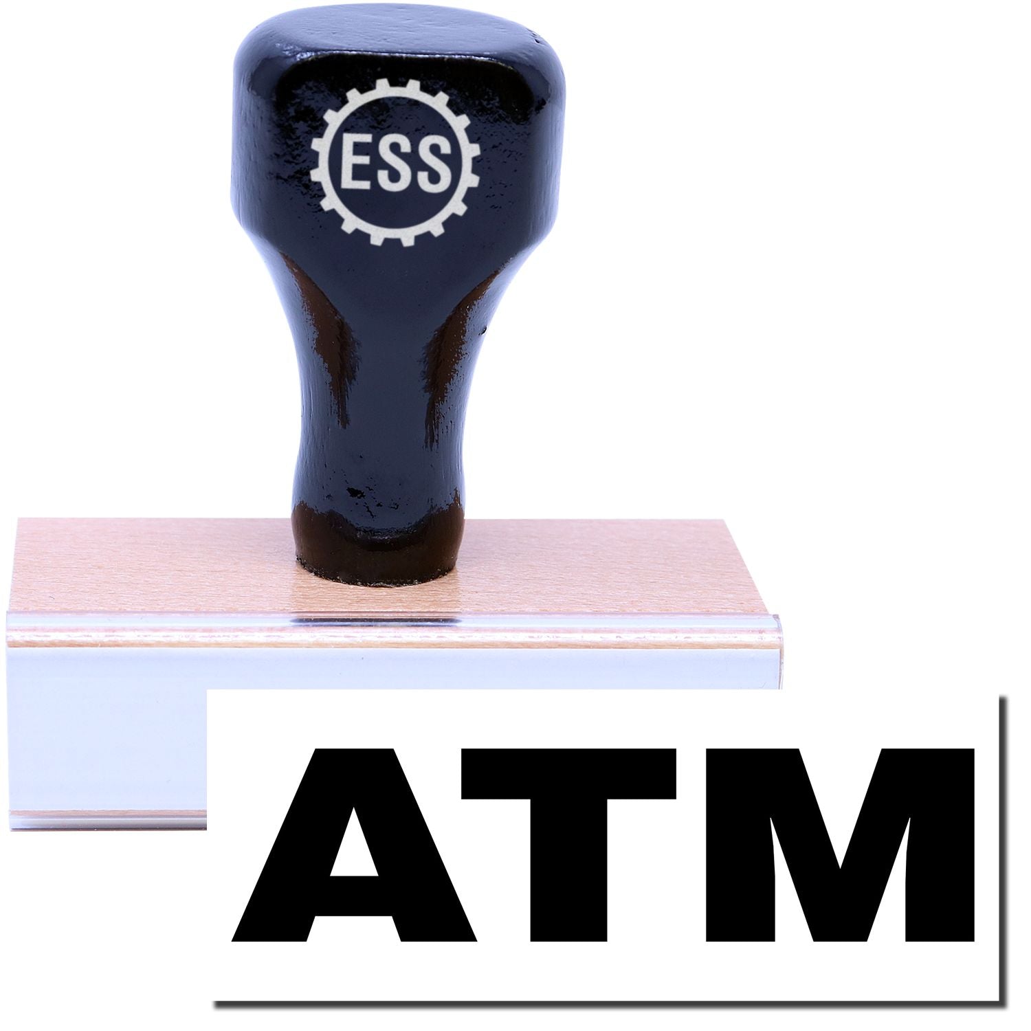 A stock office rubber stamp with a stamped image showing how the text ATM in a large font is displayed after stamping.