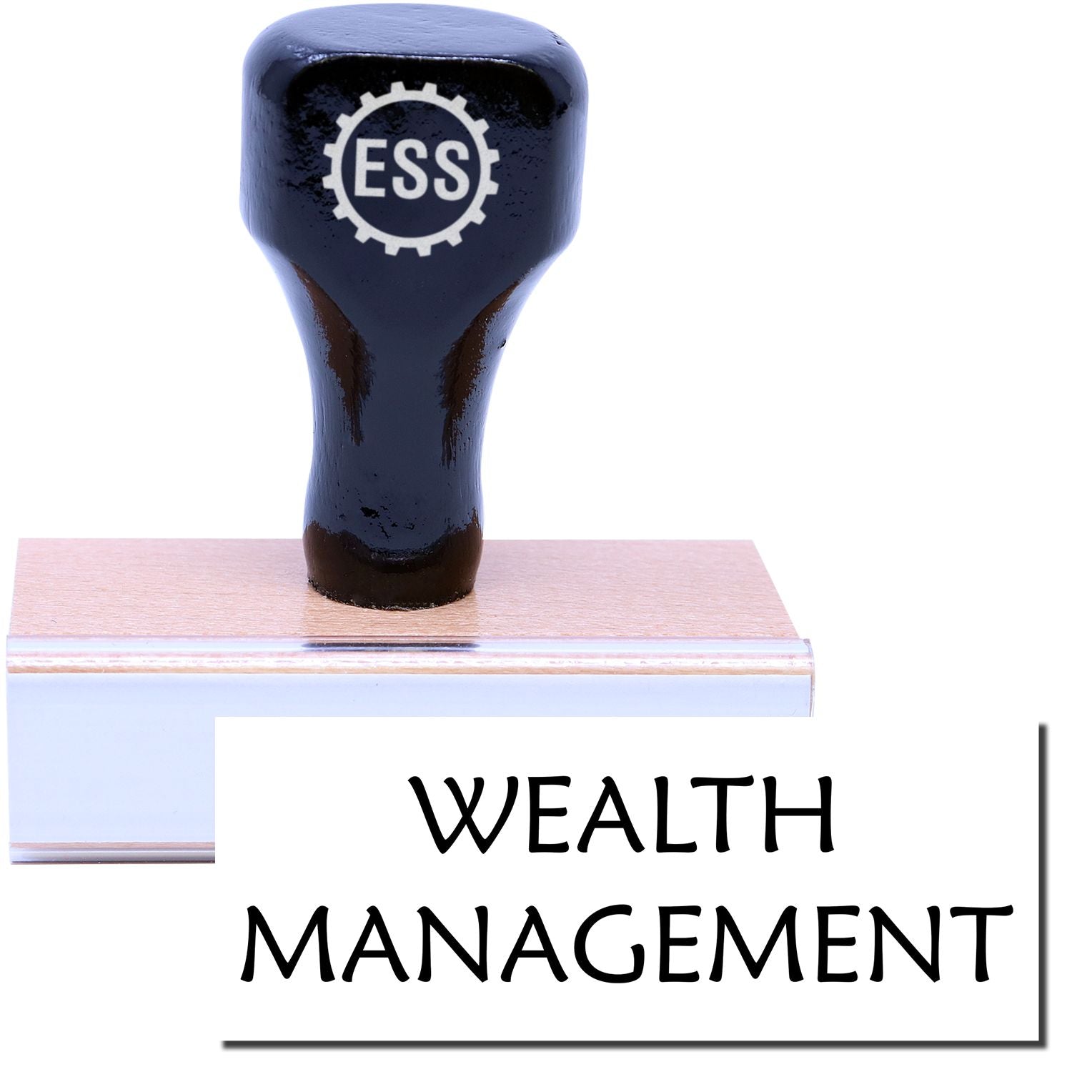 A stock office rubber stamp with a stamped image showing how the text WEALTH MANAGEMENT in a large font is displayed after stamping.