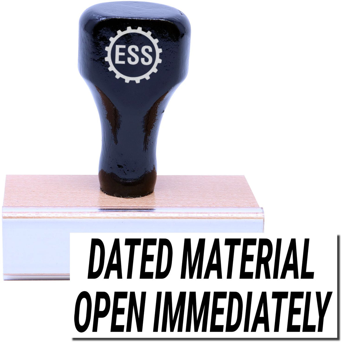 A stock office rubber stamp with a stamped image showing how the text &quot;DATED MATERIAL OPEN IMMEDIATELY&quot; is displayed after stamping.