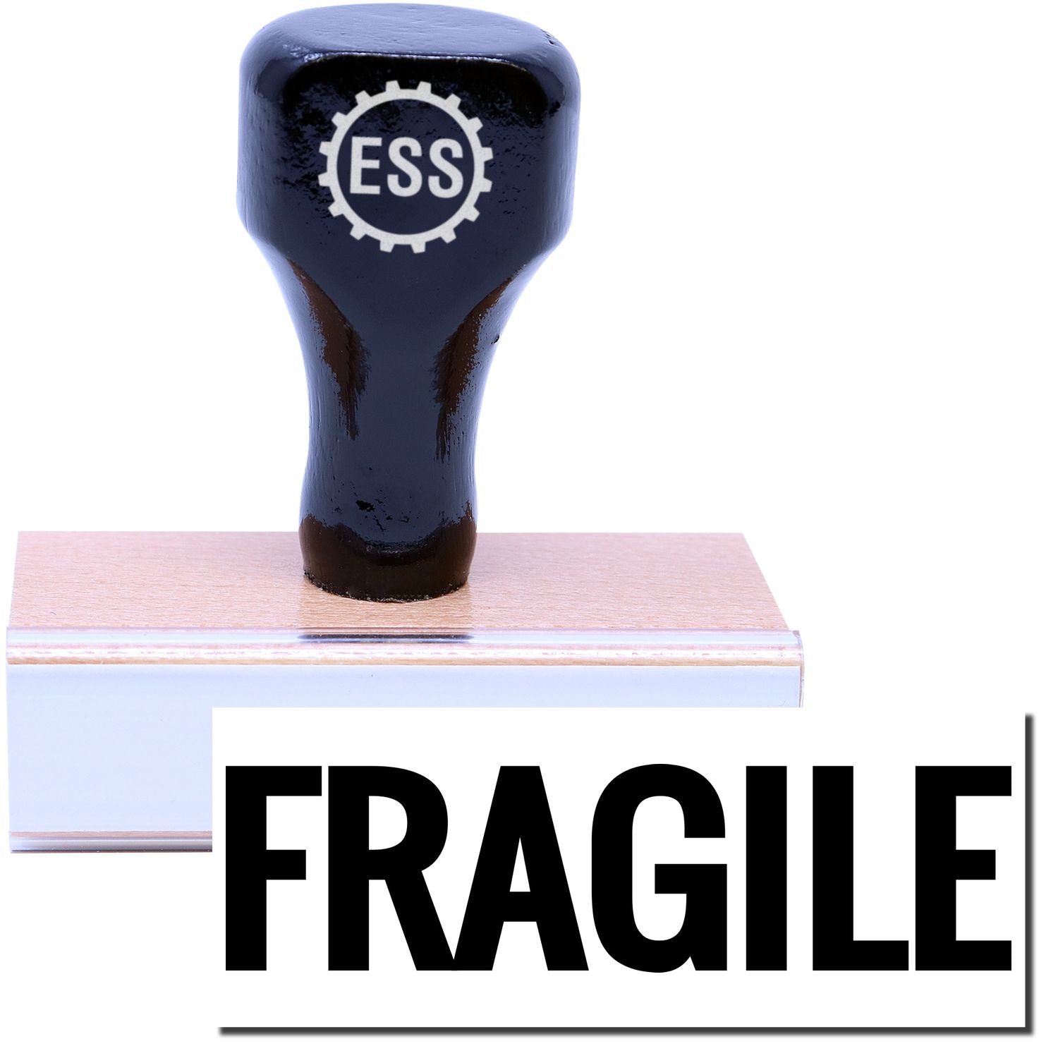 A stock office rubber stamp with a stamped image showing how the text FRAGILE in bold font is displayed after stamping.