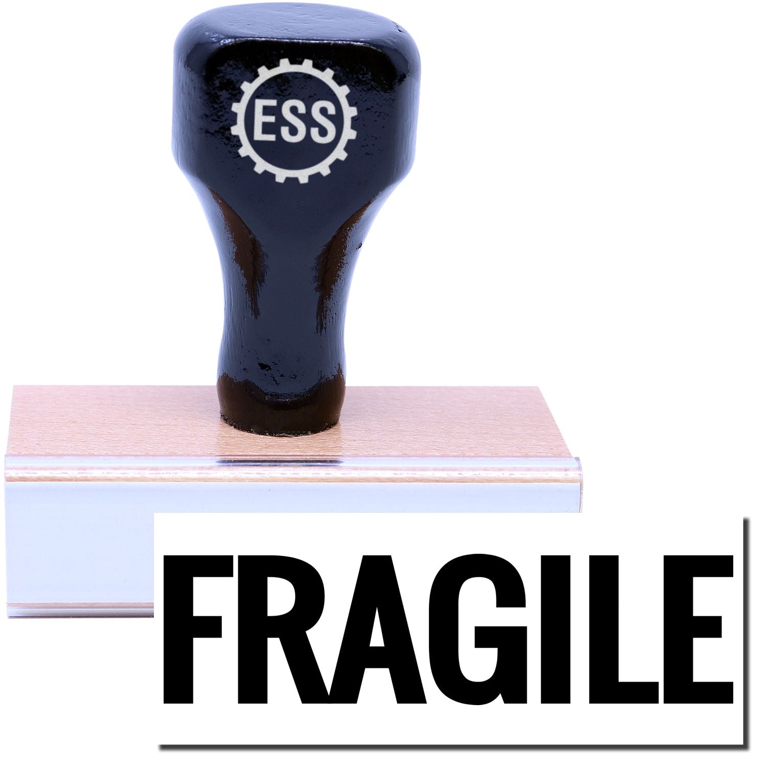 A stock office rubber stamp with a stamped image showing how the text "FRAGILE" in bold font is displayed after stamping.