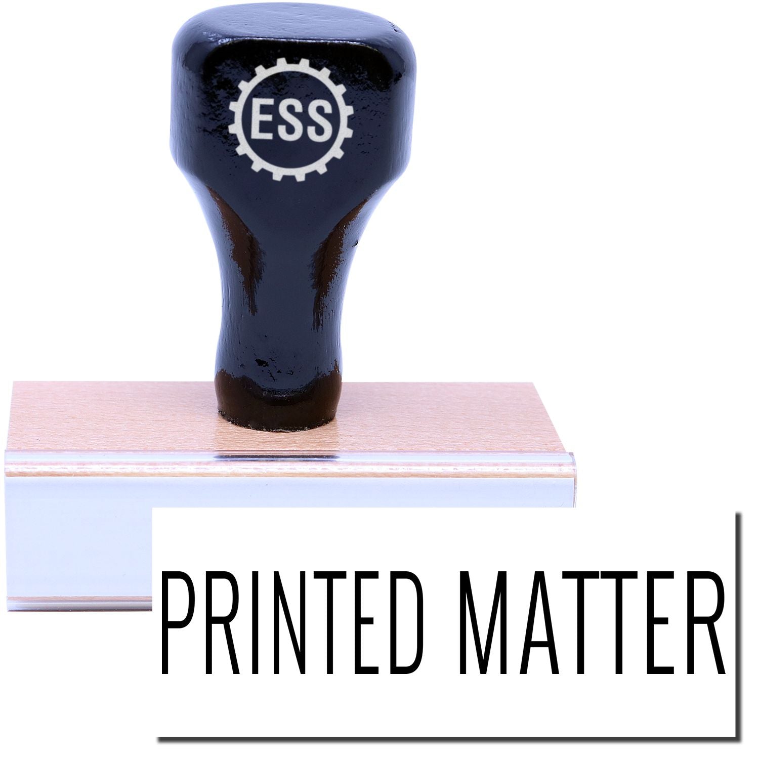 A stock office rubber stamp with a stamped image showing how the text PRINTED MATTER in a large font is displayed after stamping.