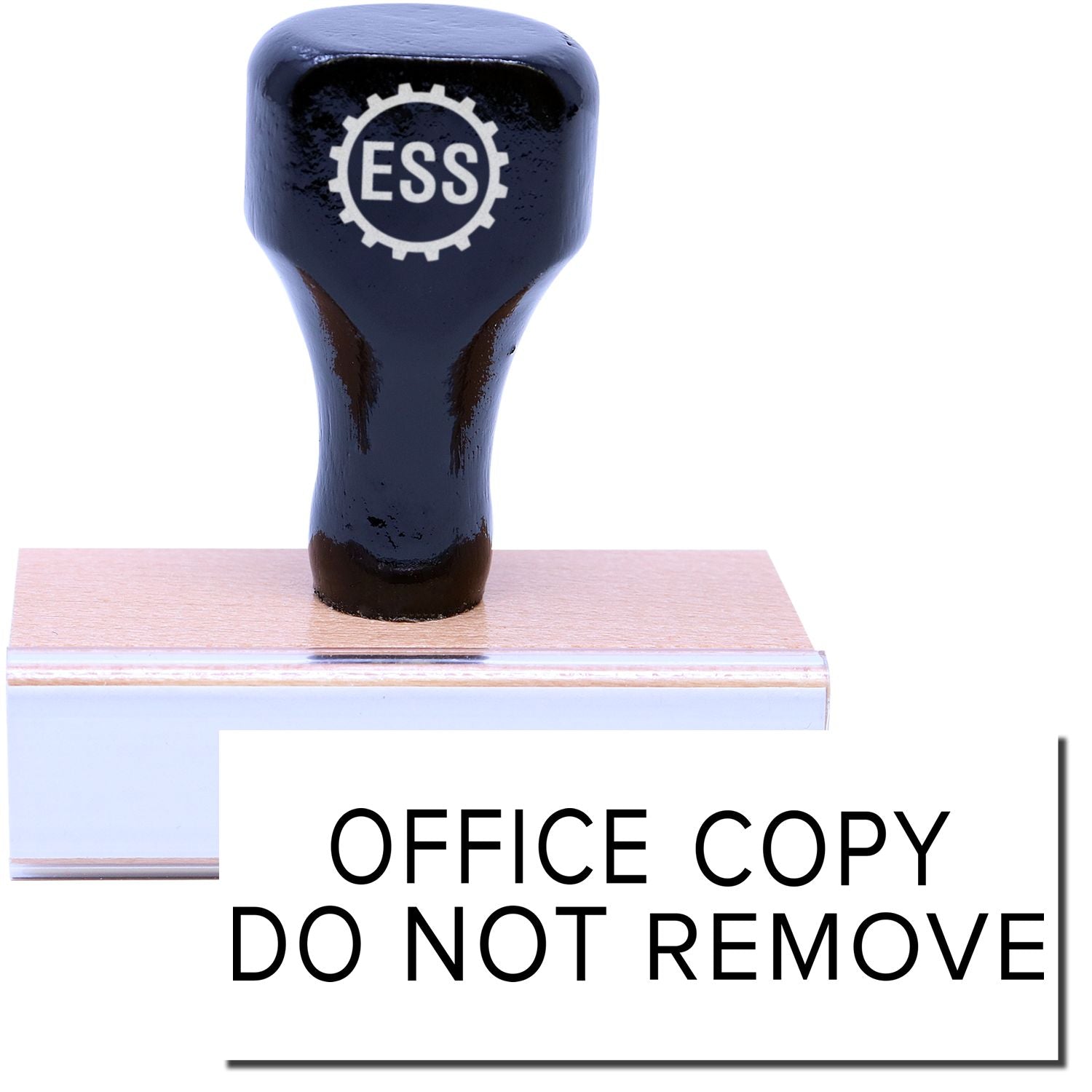 A stock office rubber stamp with a stamped image showing how the text OFFICE COPY DO NOT REMOVE in a large narrow font is displayed after stamping.