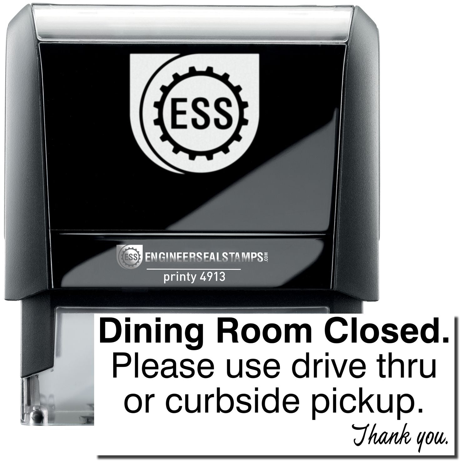 A self-inking stamp with a stamped image showing how the text Dining Room Closed. Please use drive thru or curbside pickup. Thank you. in a large font is displayed by it after stamping.