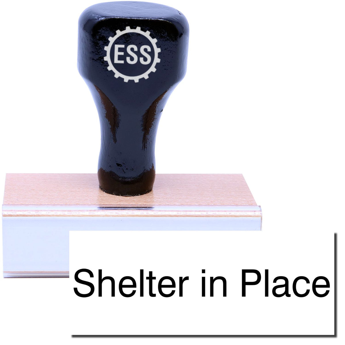 A stock office rubber stamp with a stamped image showing how the text &quot;Shelter in Place&quot; in a large font is displayed after stamping.