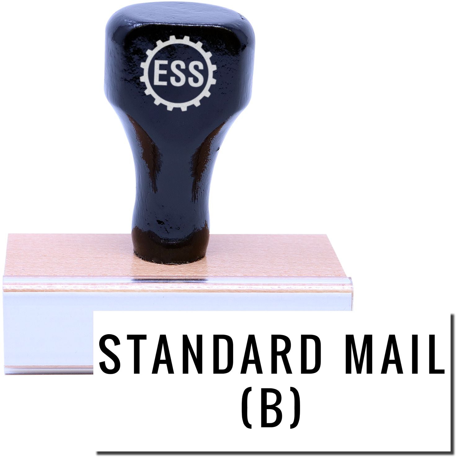 A stock office rubber stamp with a stamped image showing how the text STANDARD MAIL (B) in a large font is displayed after stamping.