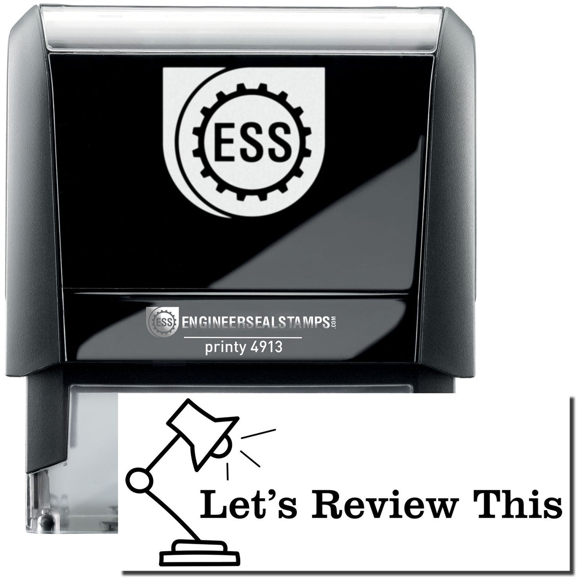 A self-inking stamp with a stamped image showing how the text &quot;Let&#39;s Review This&quot; in a large font with a Lamp is displayed by it after stamping.