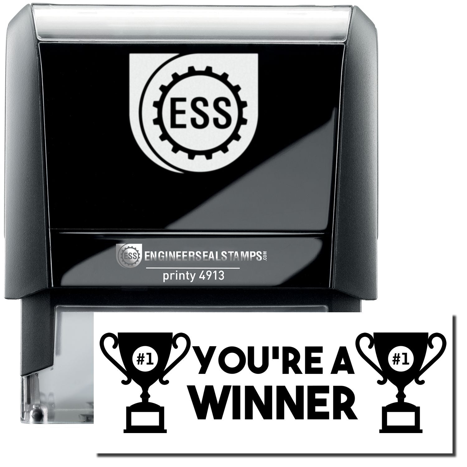 A self-inking stamp with a stamped image showing how the text "YOU'RE A WINNER" in a large bold font with images of a trophy with #1 inside on each side is displayed after stamping.