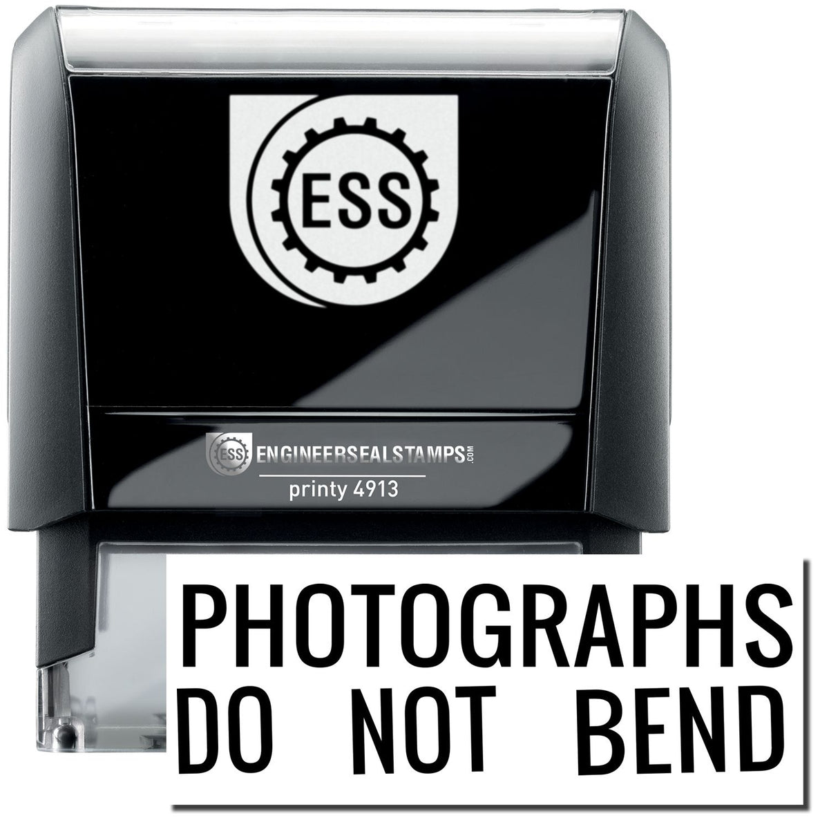 A self-inking stamp with a stamped image showing how the text &quot;PHOTOGRAPHS DO NOT BEND&quot; in a large font is displayed by it after stamping.
