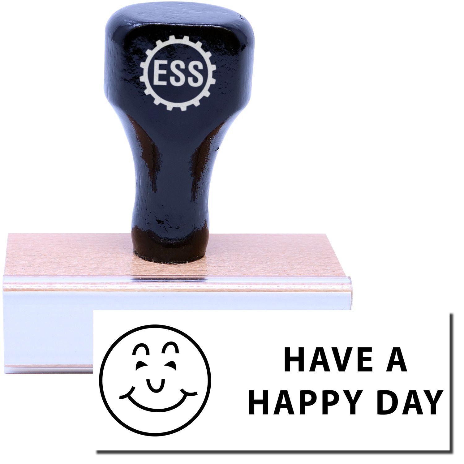 A stock office rubber stamp with a stamped image showing how the text HAVE A HAPPY DAY in a large font with an icon of a smiling face on the left side is displayed after stamping.