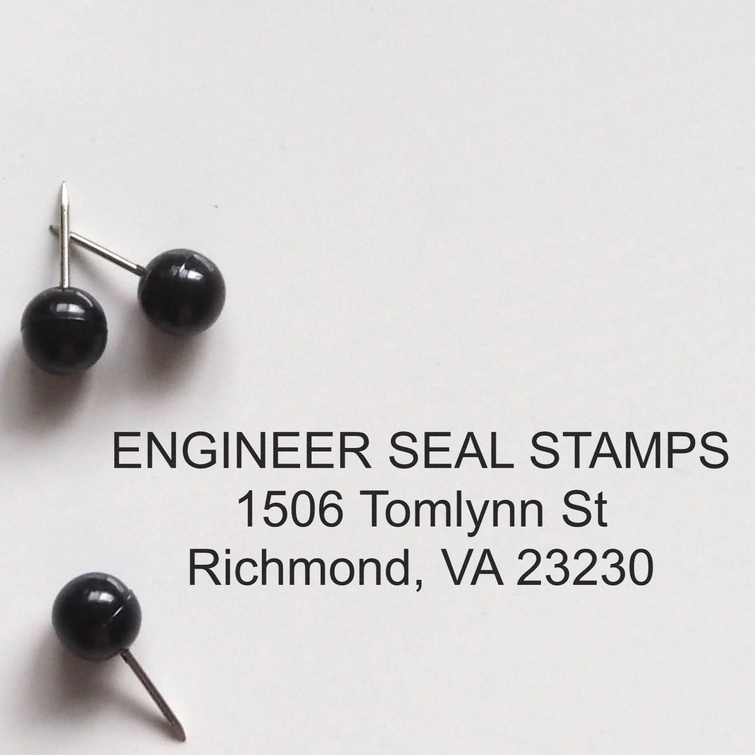 A custom rubber address stamp with a stamped image showing how any address (like the address of ESS displayed on the image) can be displayed after stamping from it.