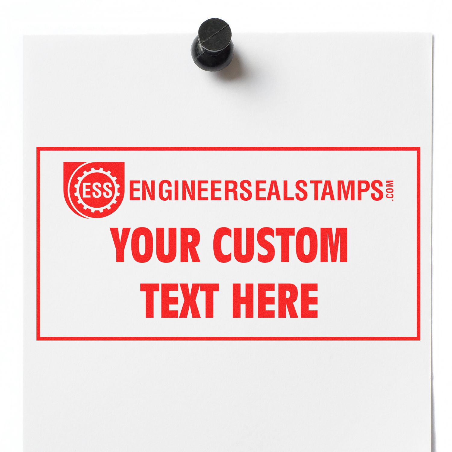 Slim Stamp 1854 Customized Pre-Inked Stamp 11/16 x 2-1/8 imprinting YOUR CUSTOM TEXT HERE in red on a white paper pinned to a board.