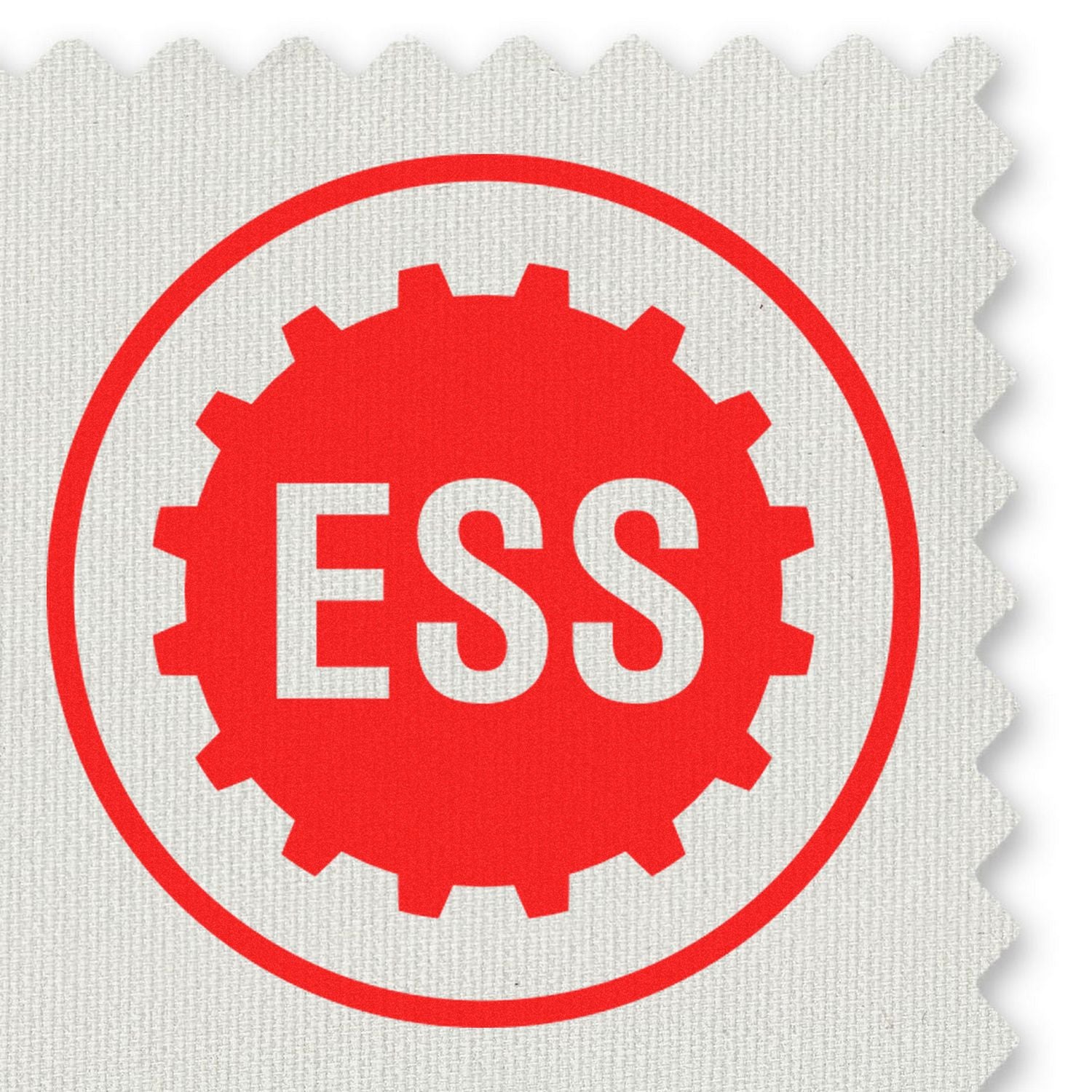 Custom Rubber Stamp Size 1 Inch Diameter with red ESS logo stamped on a textured white fabric background.