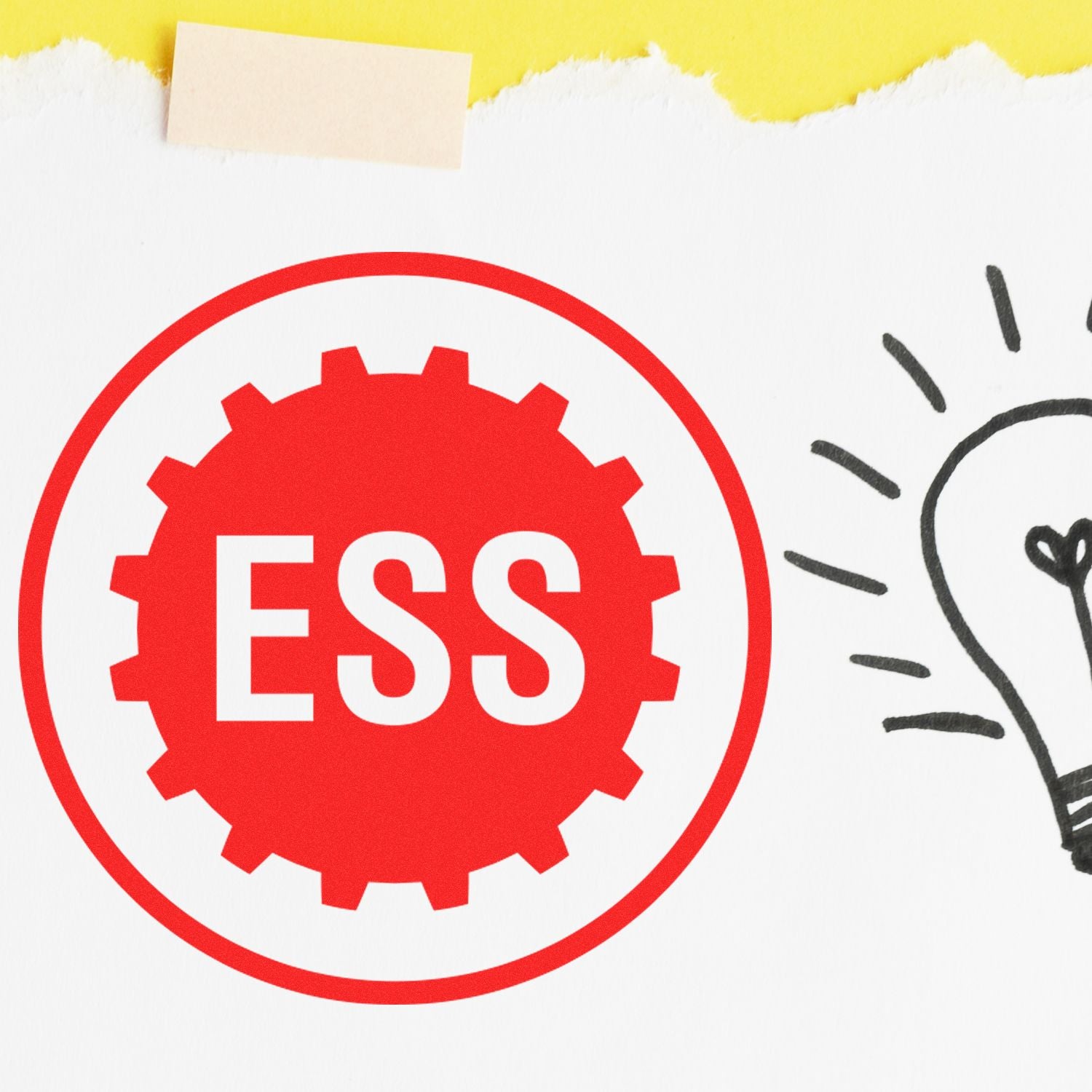 Custom Rubber Stamp Size 1/2 Inch Diameter with red ESS logo stamped on white paper next to a drawing of a light bulb.