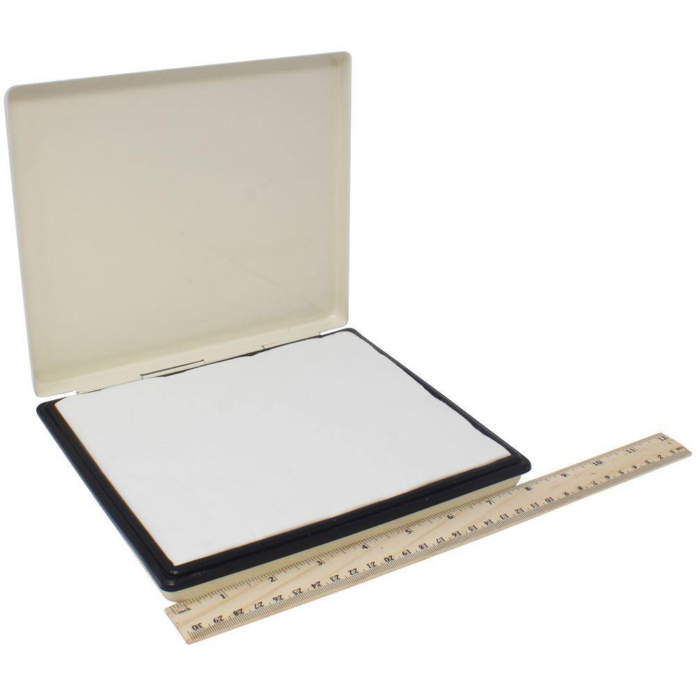 Industrial Large Stamp Pad 10 Size 6 x 8, open with a white surface, next to a ruler for scale.