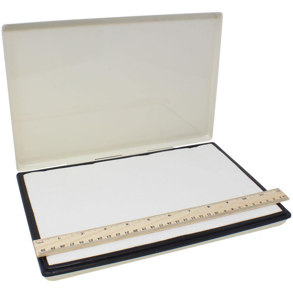 Industrial Rubber Stamp Pad-12 (Size: 6 x 12) with an open lid, showing a white pad surface and a ruler placed on top for scale.