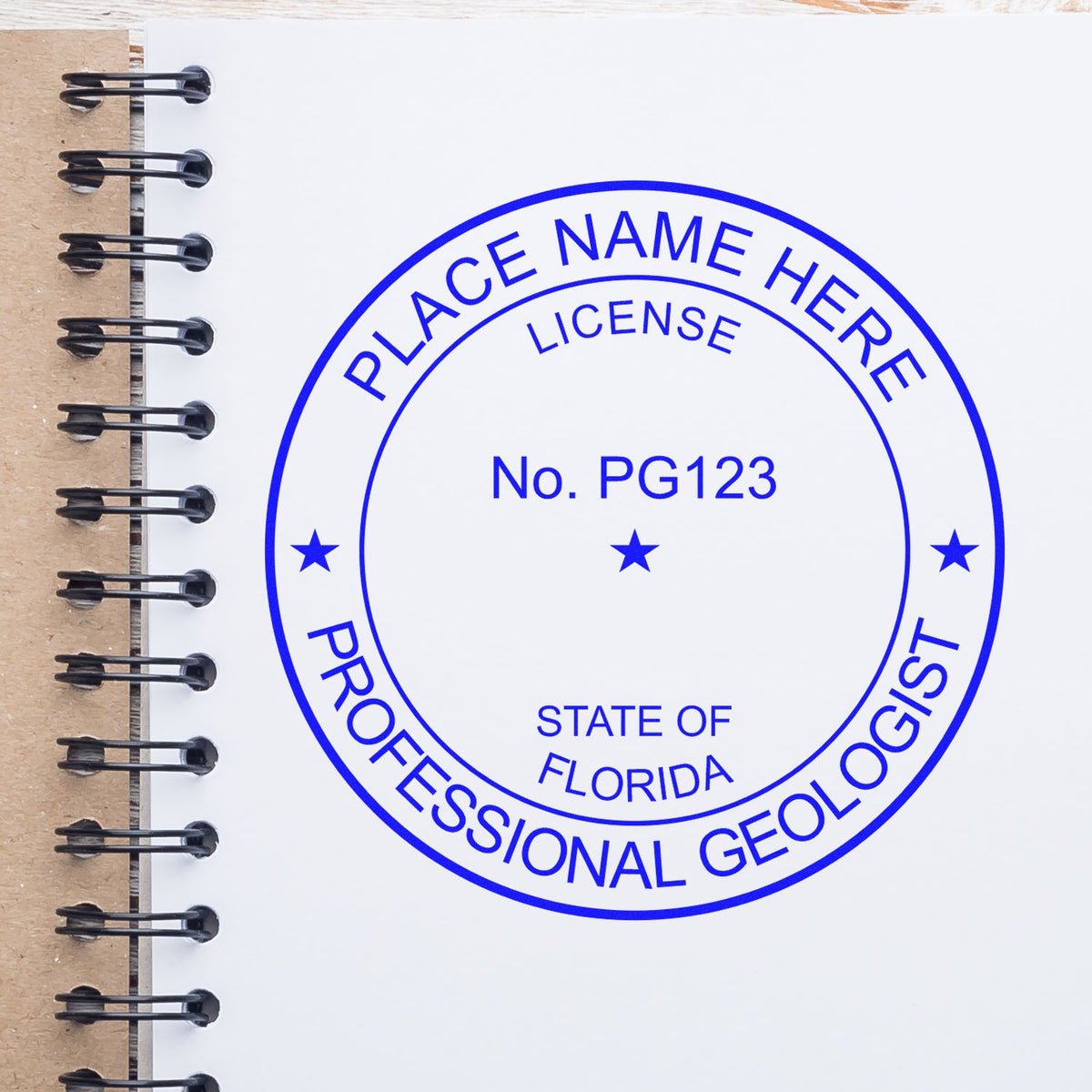An alternative view of the Slim Pre-Inked Florida Professional Geologist Seal Stamp stamped on a sheet of paper showing the image in use