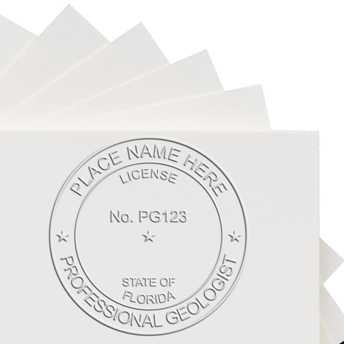A stamped imprint of the State of Florida Extended Long Reach Geologist Seal in this stylish lifestyle photo, setting the tone for a unique and personalized product.