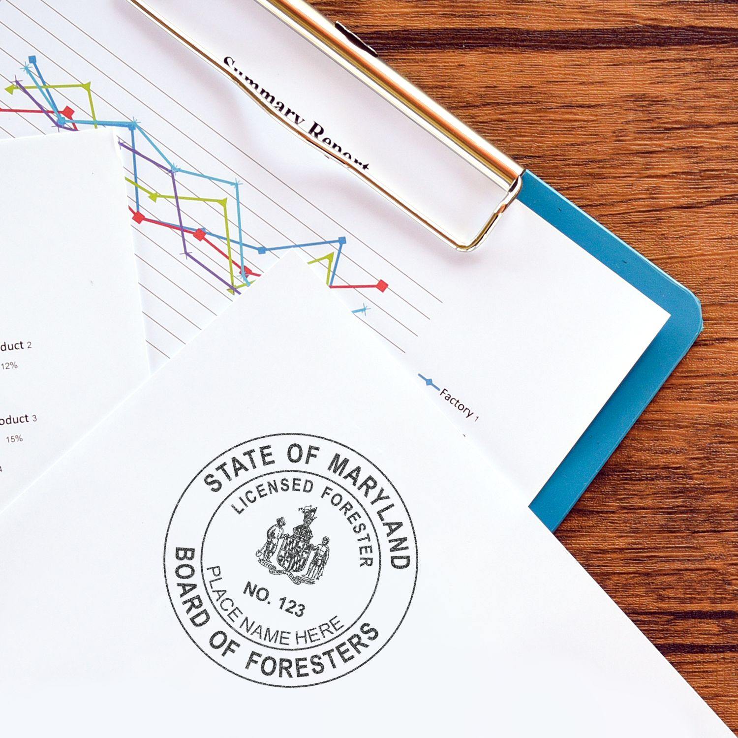 Forester Self Inking Rubber Stamp of Seal used on a document, with a clipboard and graph paper in the background.