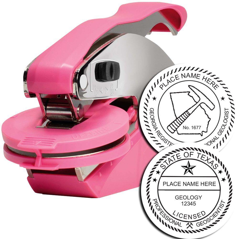 Geologist Pink Hybrid Handheld Embosser with a pink handle and two sample embossed seals, one for Georgia and one for Texas.