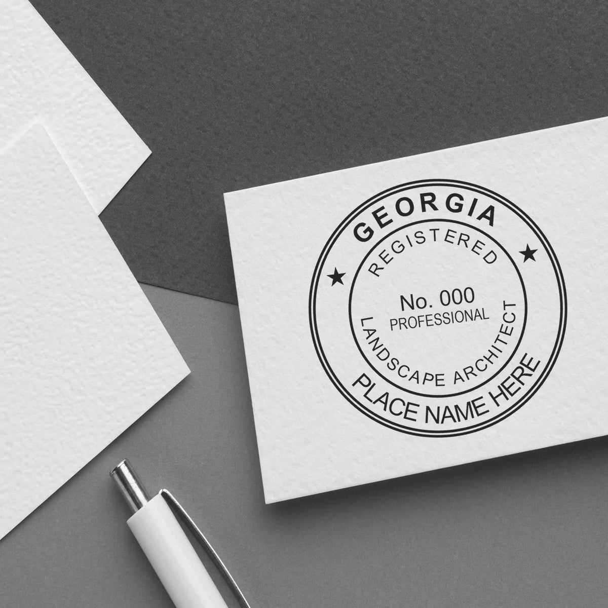 A lifestyle photo showing a stamped image of the Georgia Landscape Architectural Seal Stamp on a piece of paper