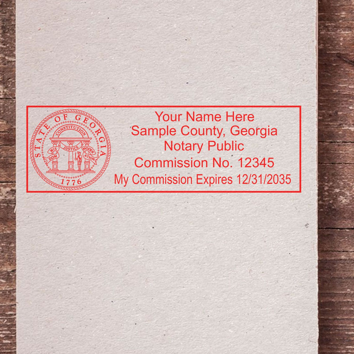 The Heavy-Duty Georgia Rectangular Notary Stamp stamp impression comes to life with a crisp, detailed photo on paper - showcasing true professional quality.