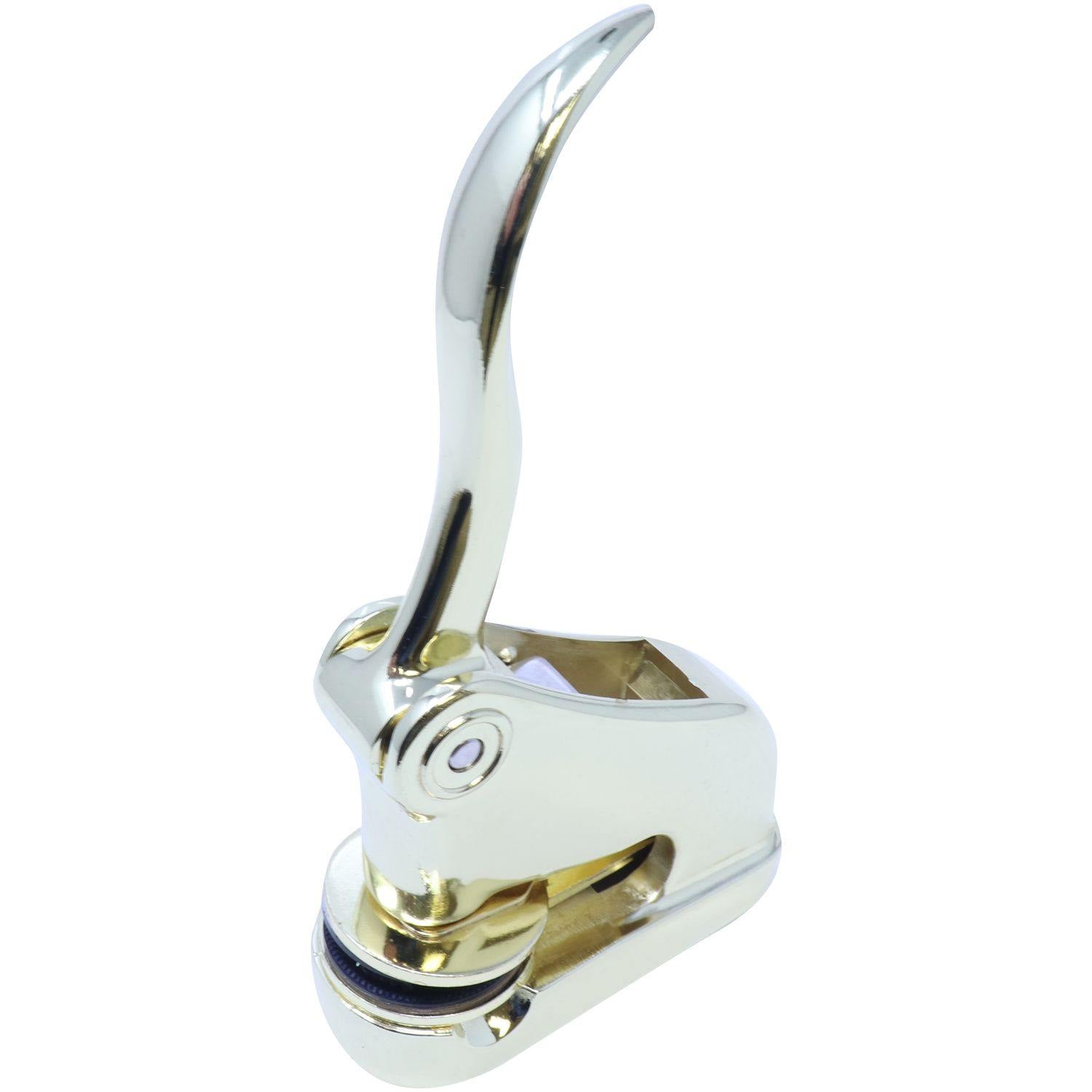 Interior Designer Gold Gift Seal Embosser with a sleek, shiny gold finish and ergonomic handle, angled side view.