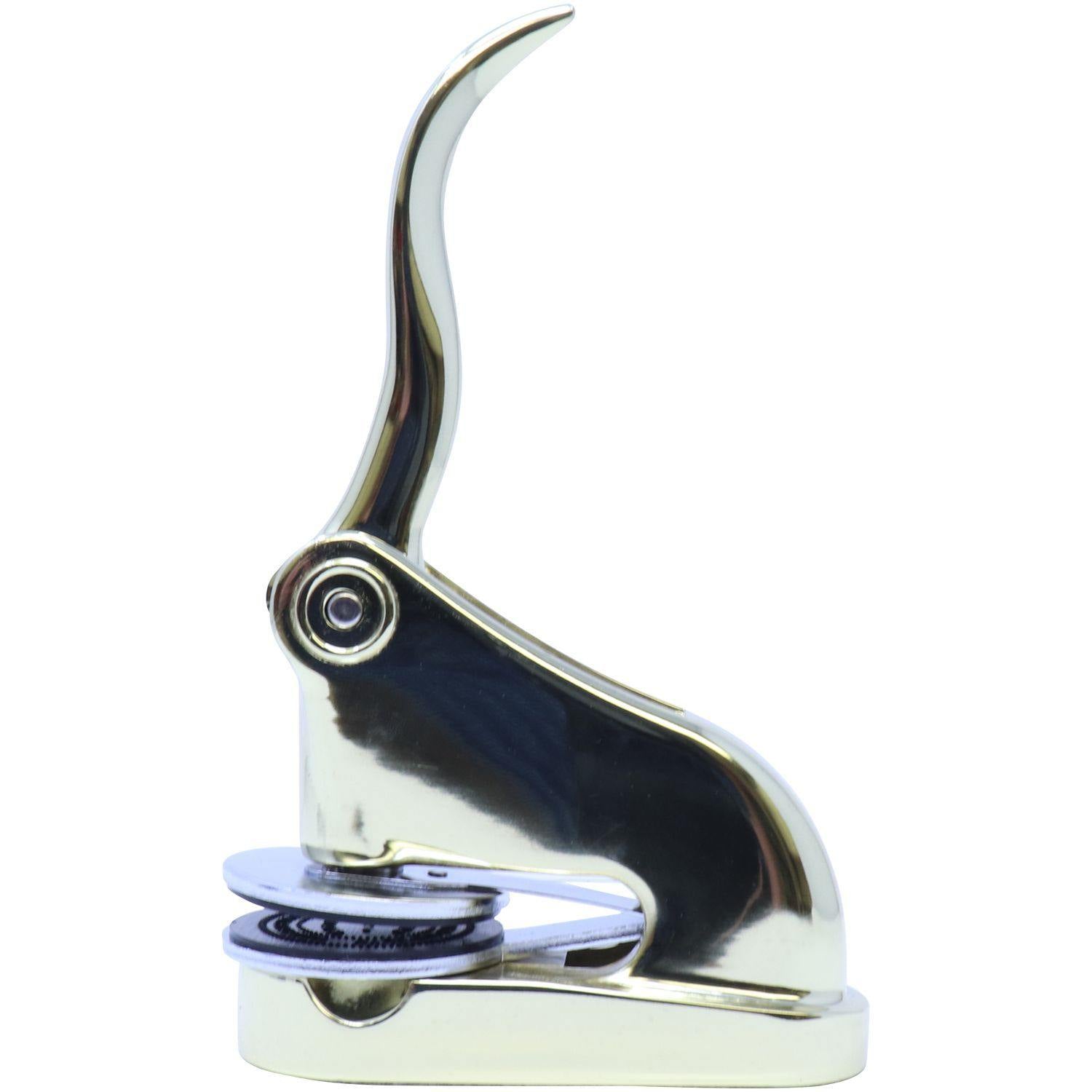 Architect Gold Gift Seal Embosser with a sleek, metallic finish, angled side view showing the detailed imprint mechanism.