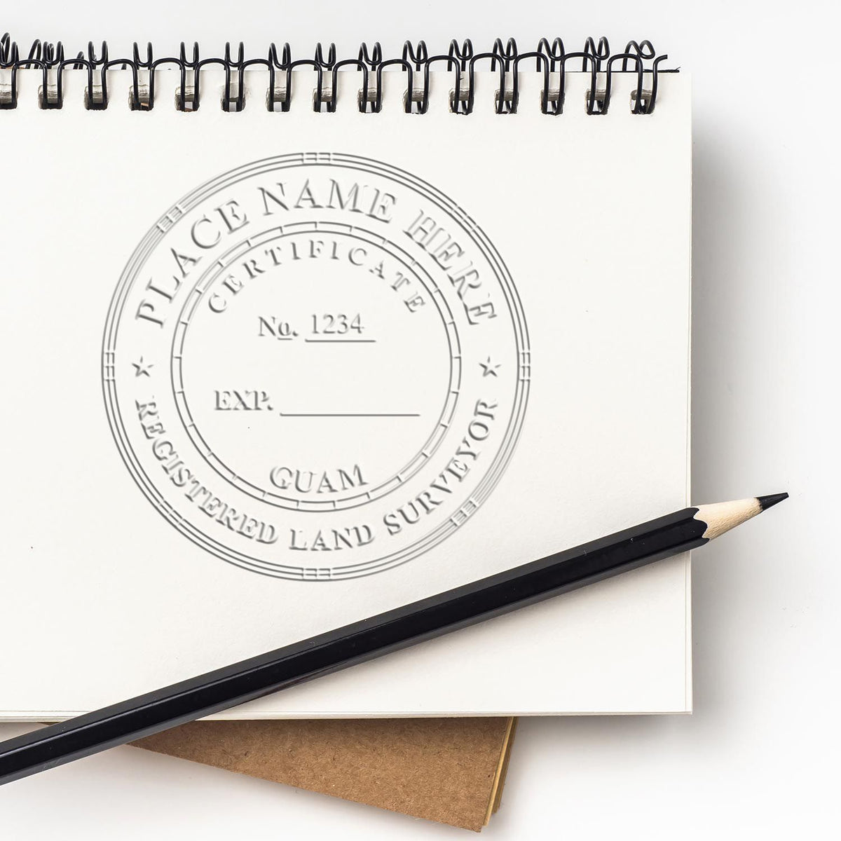 A photograph of the Guam Desk Surveyor Seal Embosser stamp impression reveals a vivid, professional image of the on paper.