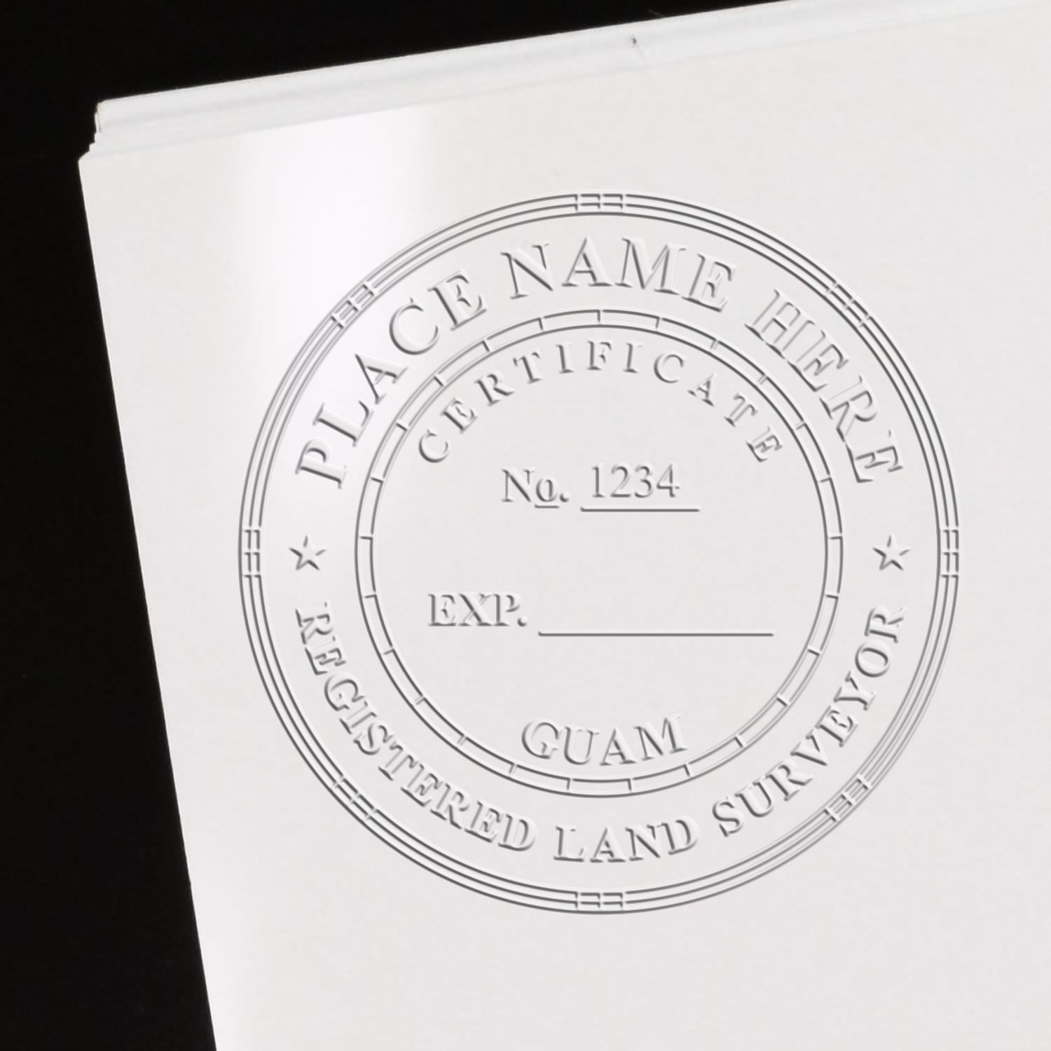 A lifestyle photo showing a stamped image of the Handheld Guam Land Surveyor Seal on a piece of paper