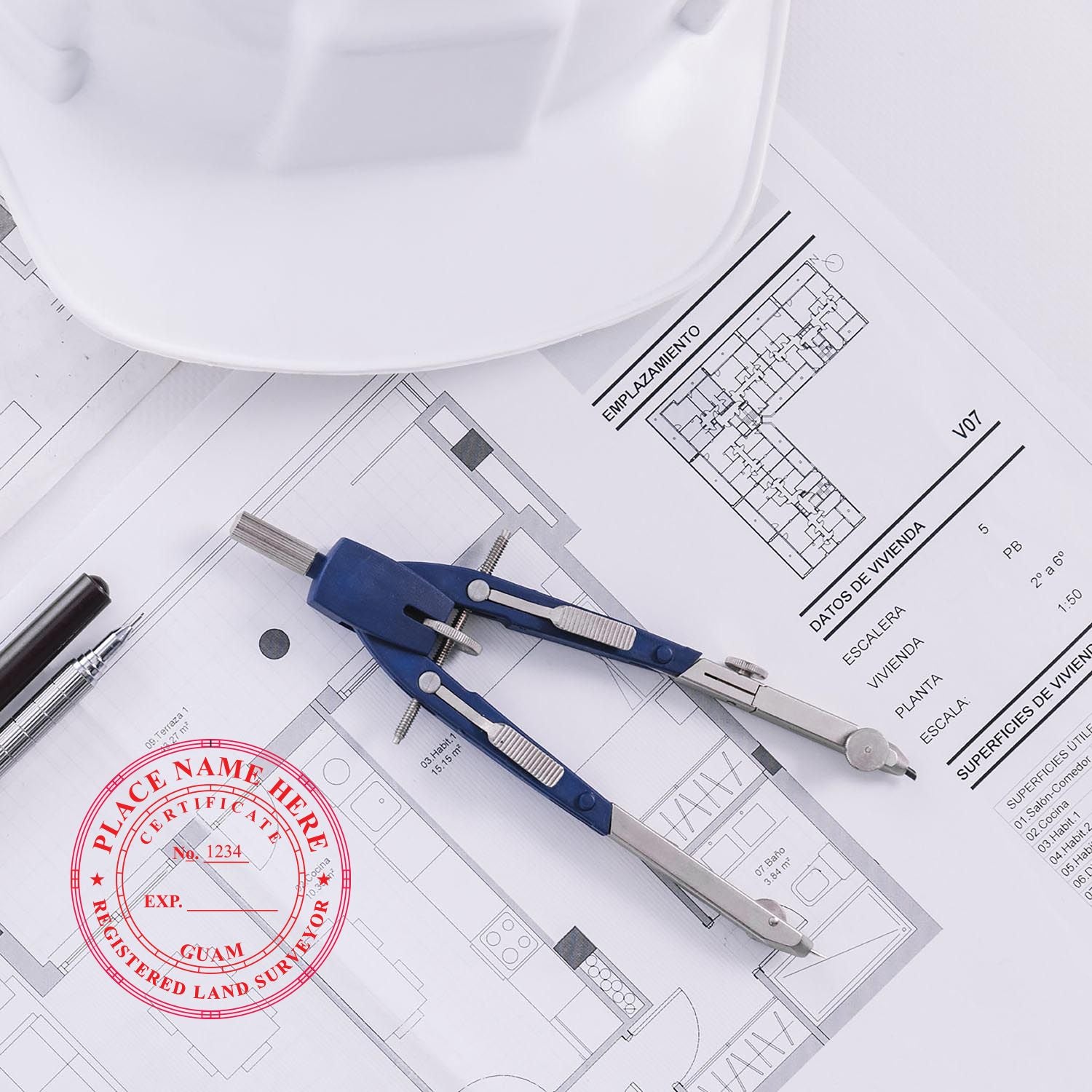 Premium MaxLight Pre-Inked Guam Surveyors Stamp on architectural plans with a compass, pen, and hard hat.