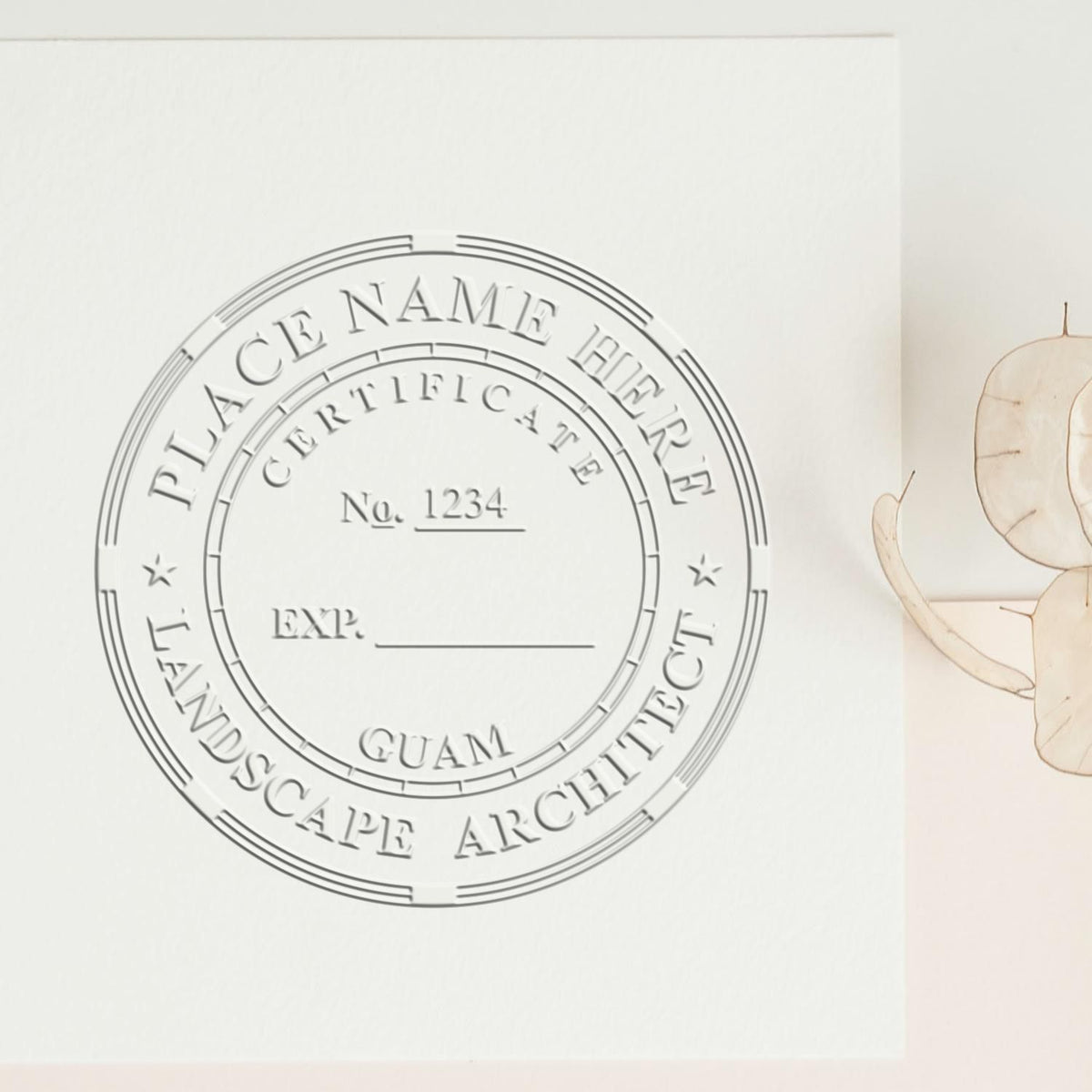 A photograph of the Hybrid Guam Landscape Architect Seal stamp impression reveals a vivid, professional image of the on paper.