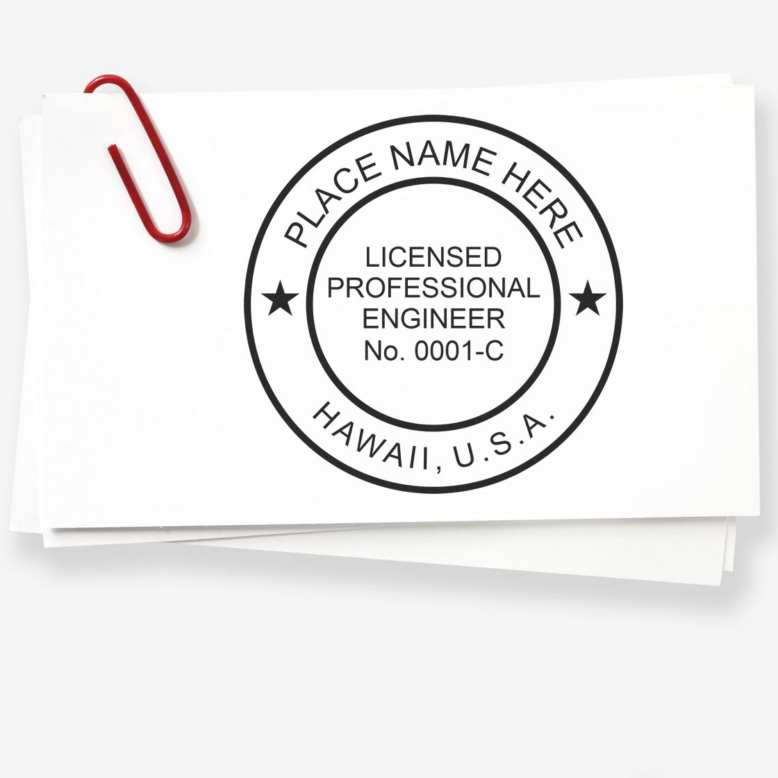 A lifestyle photo showing a stamped image of the Slim Pre-Inked Hawaii Professional Engineer Seal Stamp on a piece of paper
