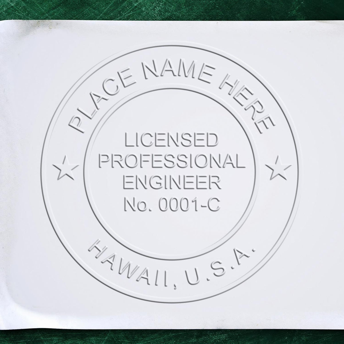An in use photo of the Hybrid Hawaii Engineer Seal showing a sample imprint on a cardstock