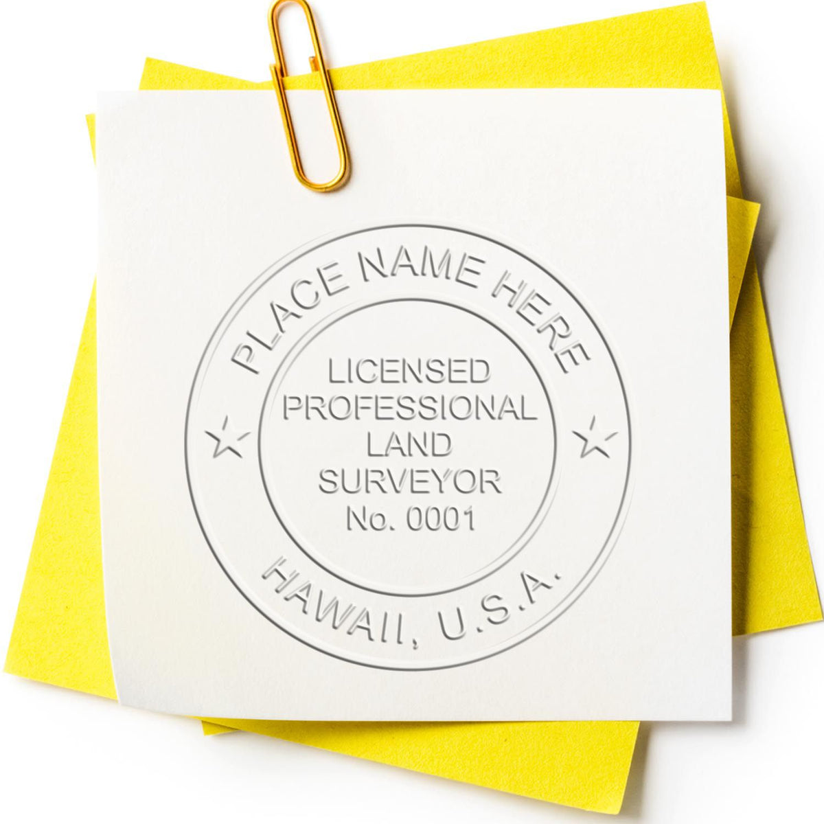 An in use photo of the Hybrid Hawaii Land Surveyor Seal showing a sample imprint on a cardstock