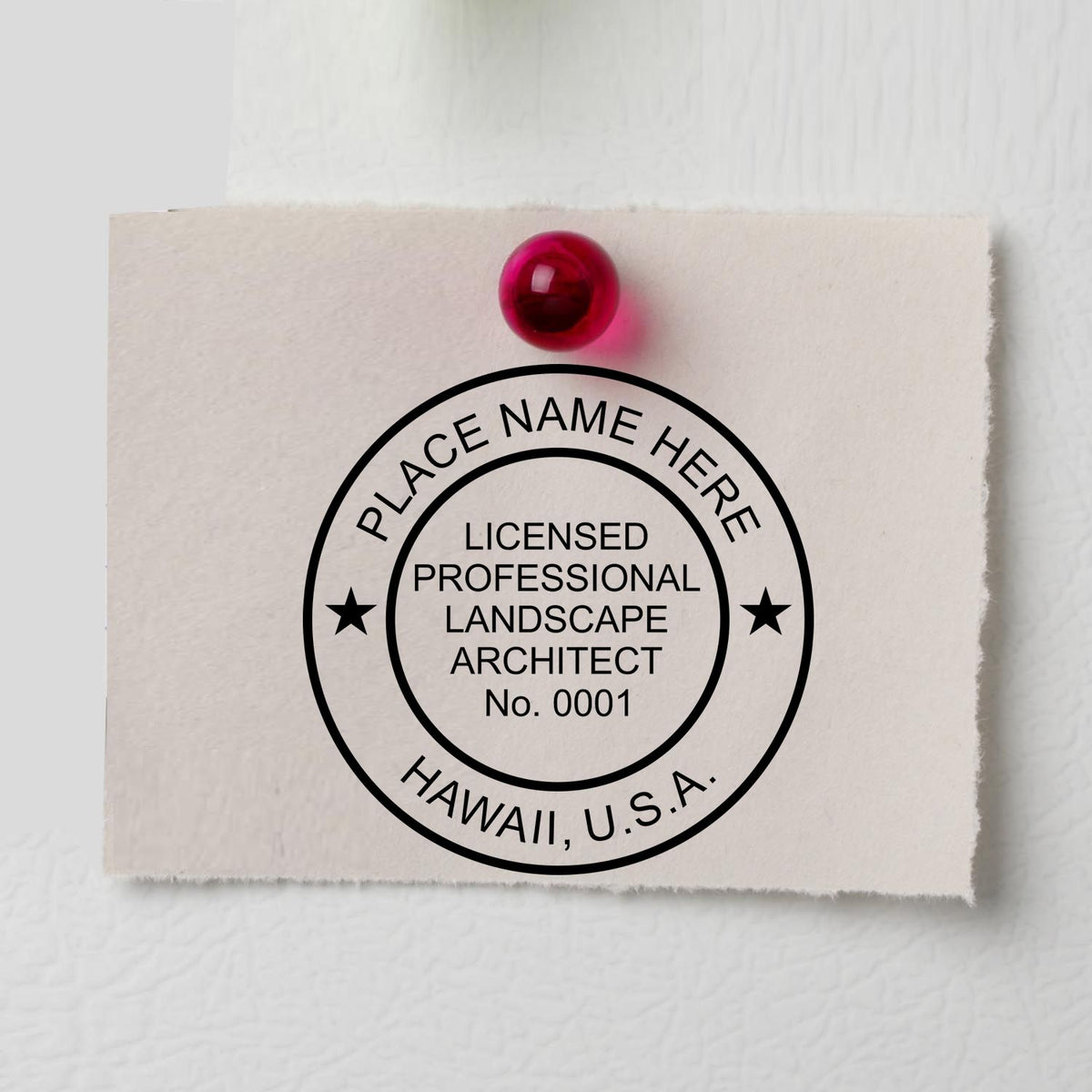 A lifestyle photo showing a stamped image of the Digital Hawaii Landscape Architect Stamp on a piece of paper