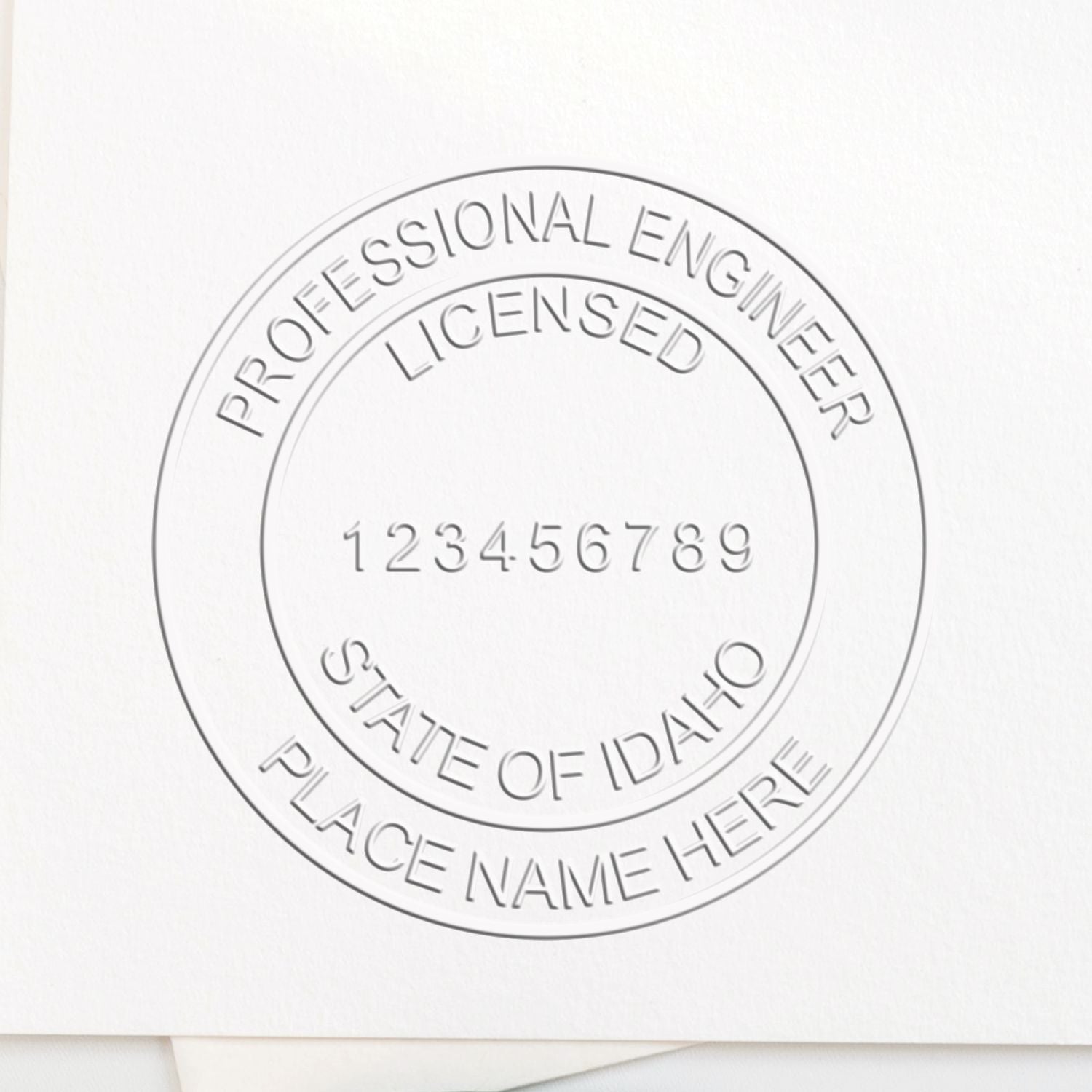 The State of Idaho Extended Long Reach Engineer Seal stamp impression comes to life with a crisp, detailed photo on paper - showcasing true professional quality.