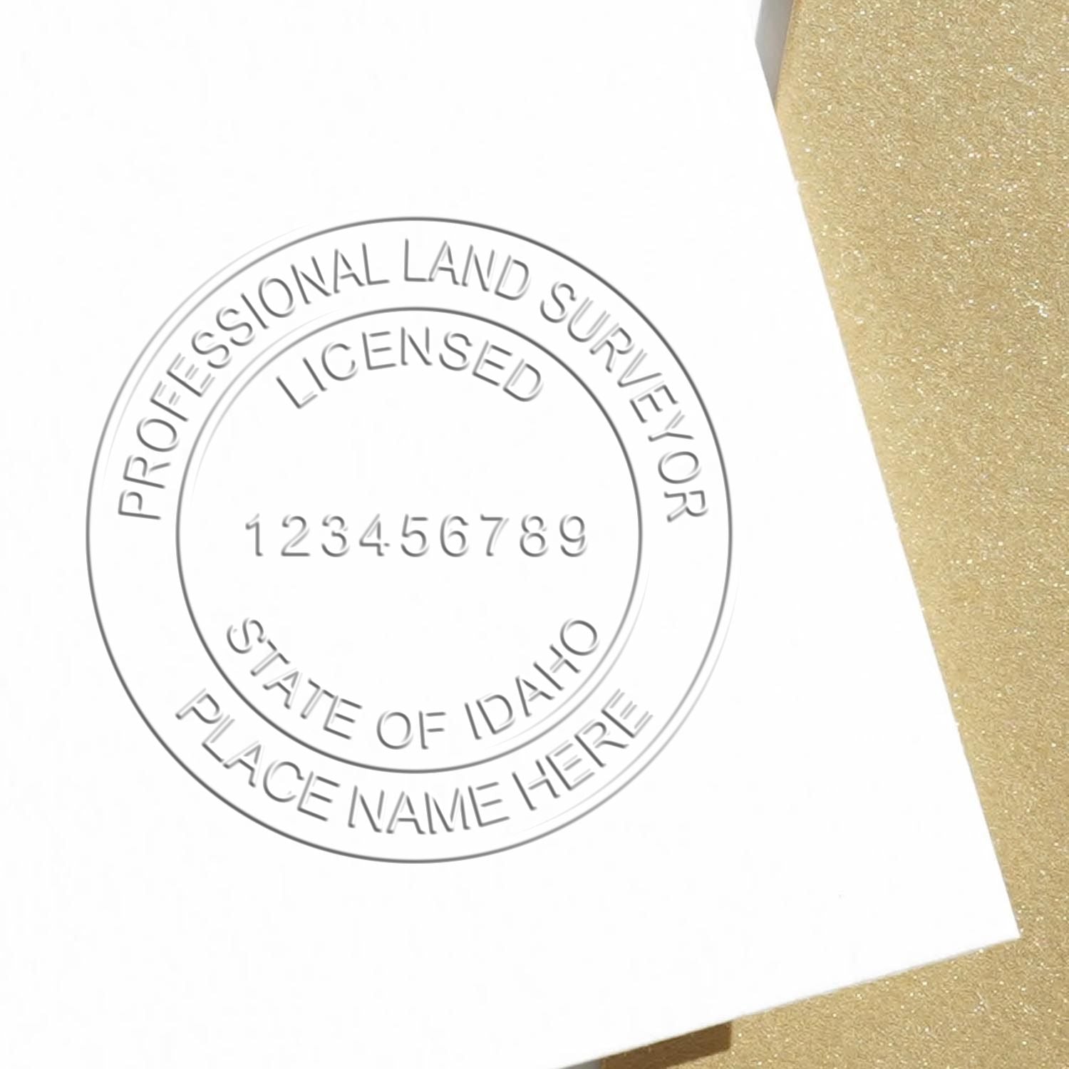 A photograph of the Hybrid Idaho Land Surveyor Seal stamp impression reveals a vivid, professional image of the on paper.