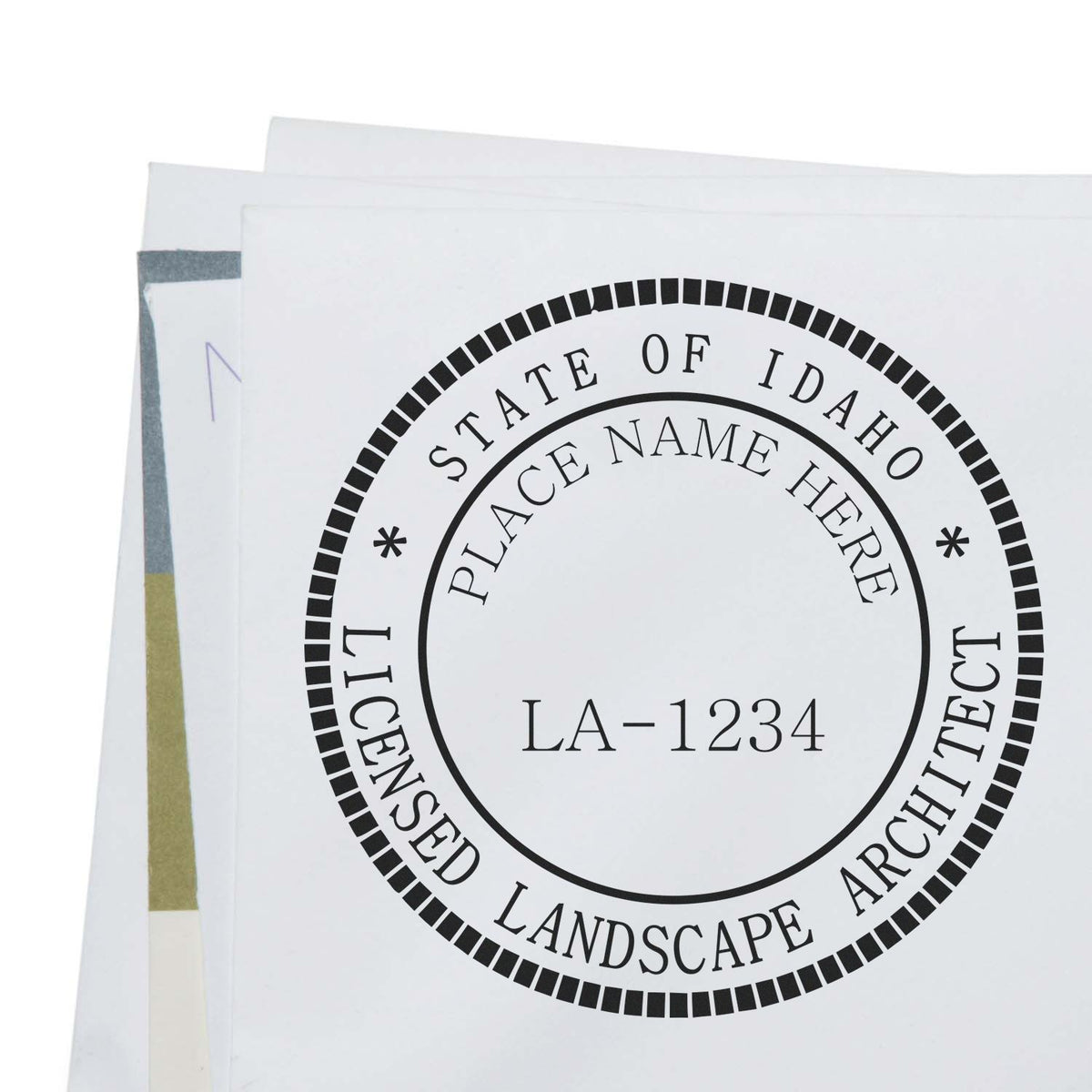 This paper is stamped with a sample imprint of the Premium MaxLight Pre-Inked Idaho Landscape Architectural Stamp, signifying its quality and reliability.