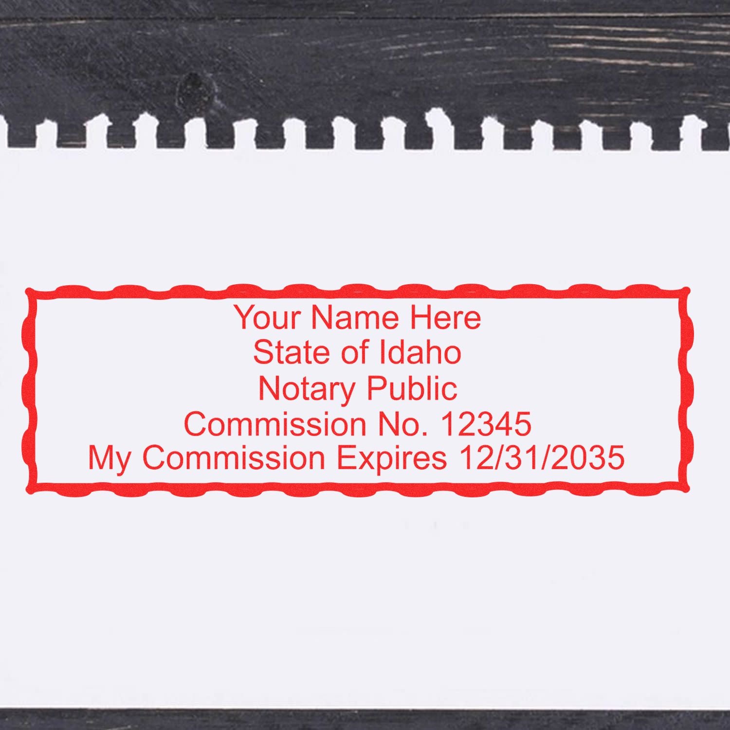 A stamped impression of the Wooden Handle Idaho Rectangular Notary Public Stamp in this stylish lifestyle photo, setting the tone for a unique and personalized product.